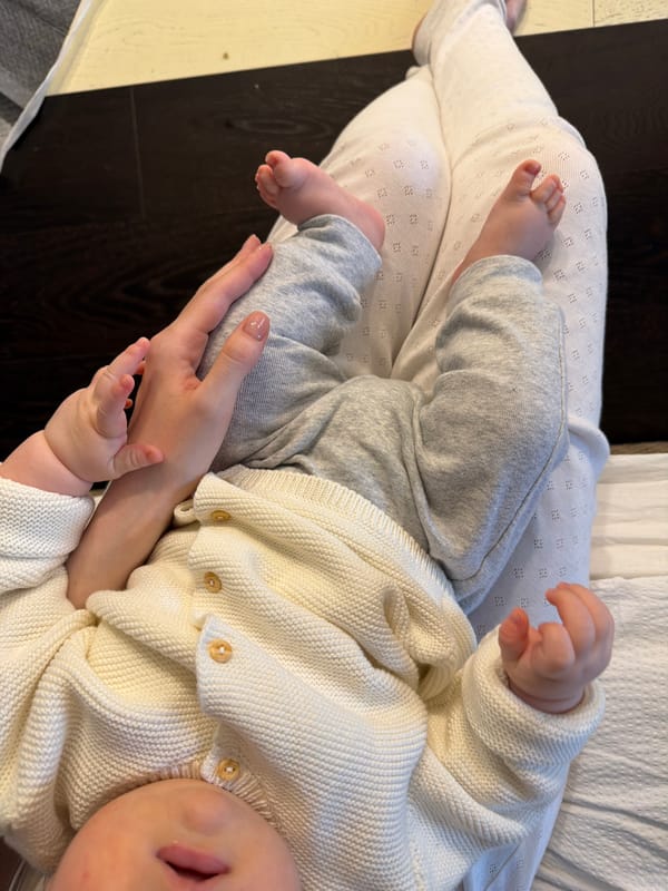 Parent and baby share tender moments in Khimki home