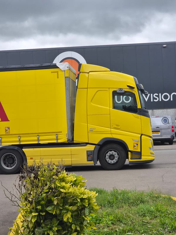 Morning scenes documented at Luxembourg logistics facility during rainfall