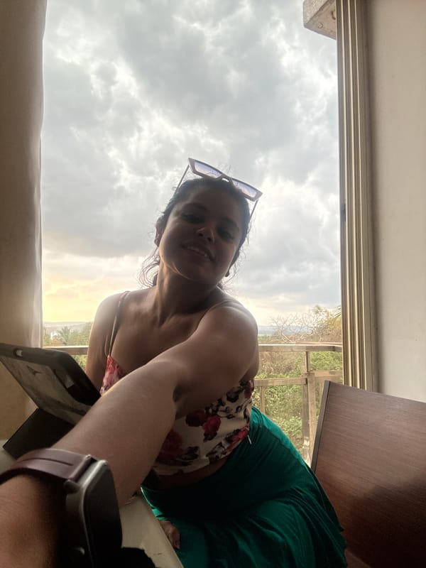 Indoor selfie and overcast sky captured in Sangolda, India