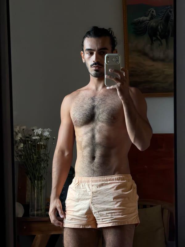 Man takes mirror selfie indoors in North Kuta