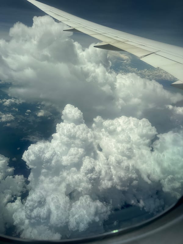 Morning flight over Thuận An, clouds, rivers, and cabin life