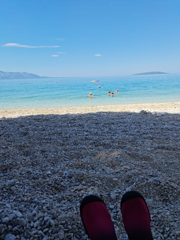 Summer morning on the Adriatic pebble beach at Gradac