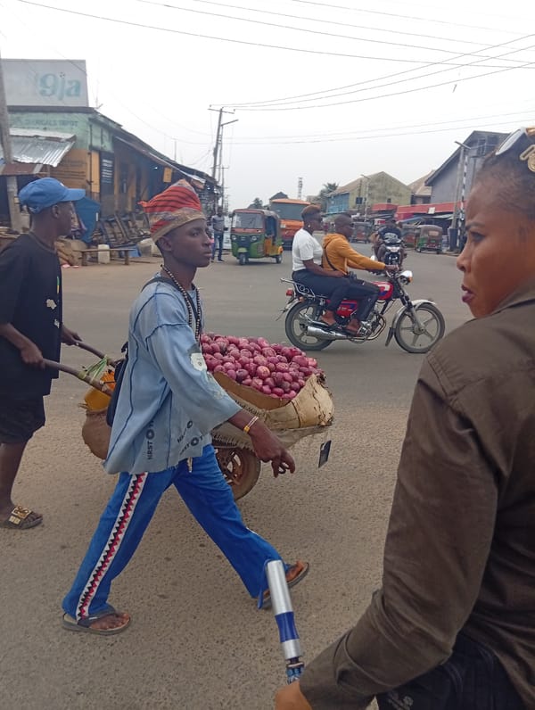 Street life documented in Aba, Nigeria under overcast skies