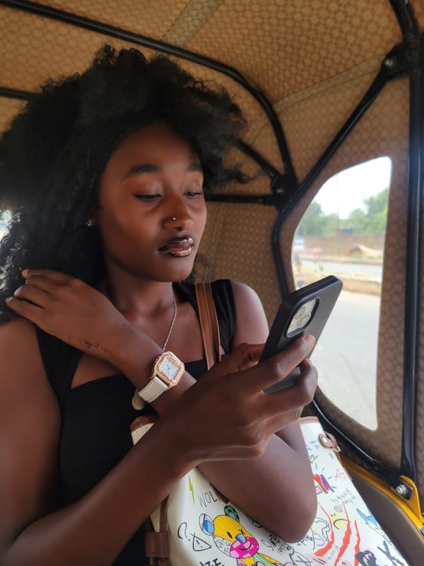 Woman travels by auto rickshaw in Jos, Nigeria