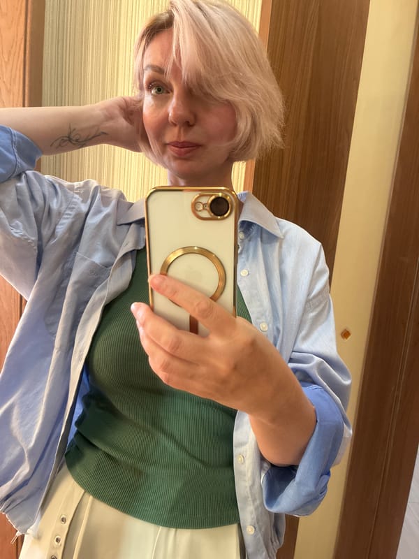 Woman takes mirror selfies in Sochi apartment