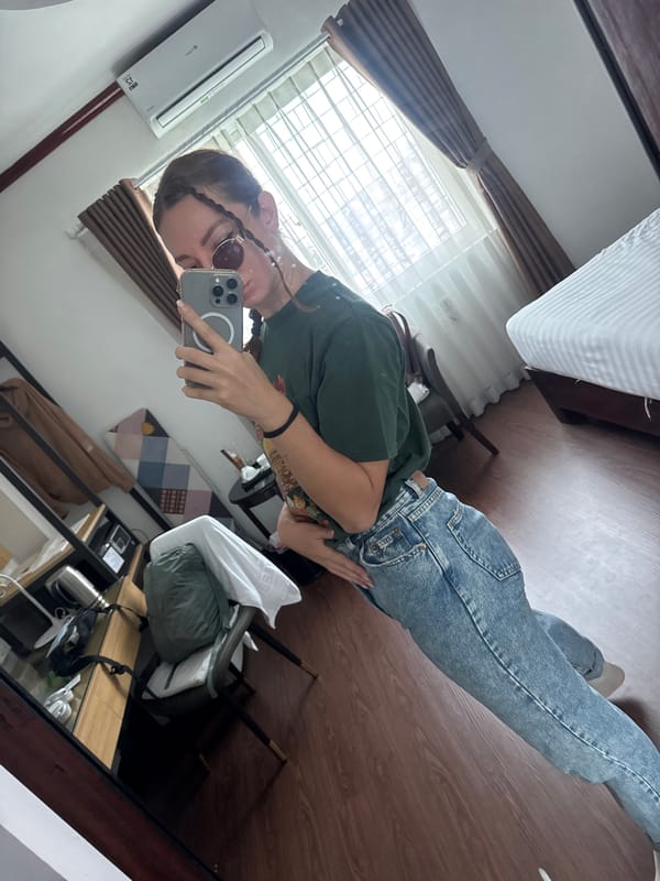 Hotel selfies during a Hanoi stopover, July 2026