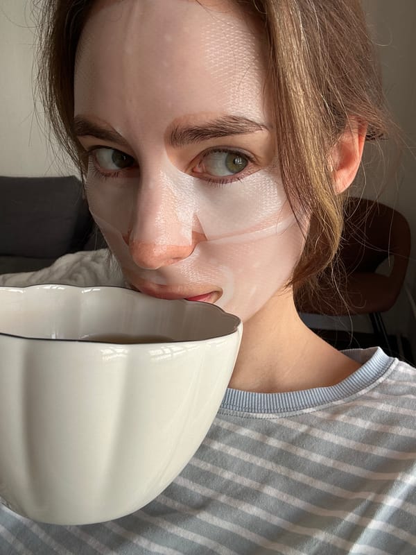 Woman documents skincare routine with face mask in Kiel