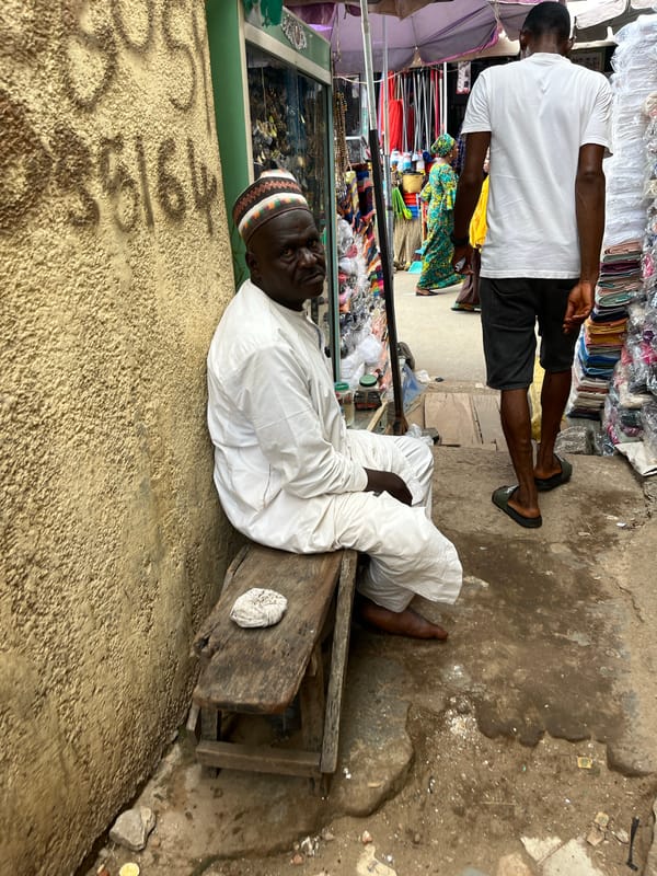Afternoon street market activity across central Abuja
