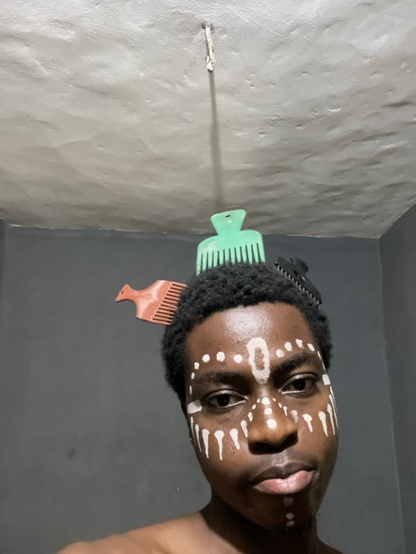 Person with traditional face paint photographed in Nkpor, Nigeria