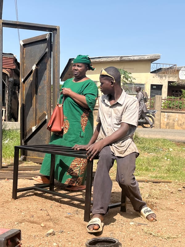 Morning street life and metalwork in Jos, Nigeria