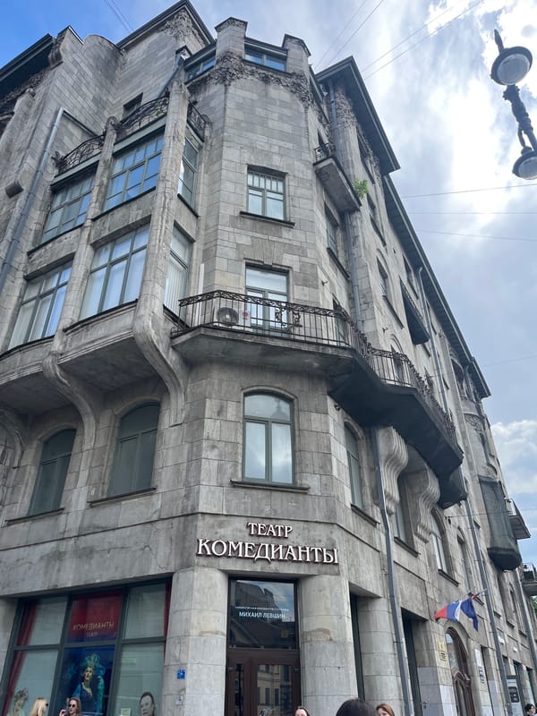 Afternoon stroll past historic stone buildings in Saint Petersburg