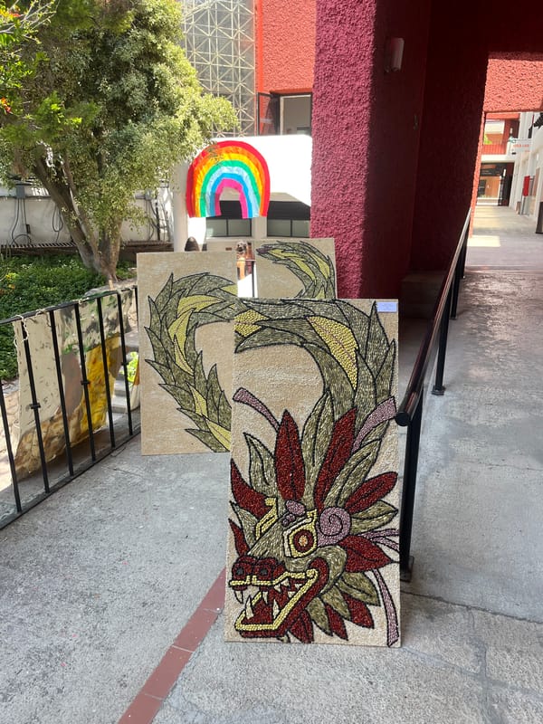 Art exhibition displays paintings indoors and outdoors in Cholula