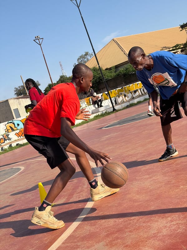Morning basketball drills at an outdoor court in Jos, Nigeria