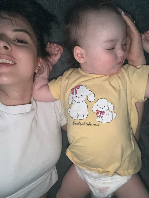 Mother and baby share quiet moment in Shushary home