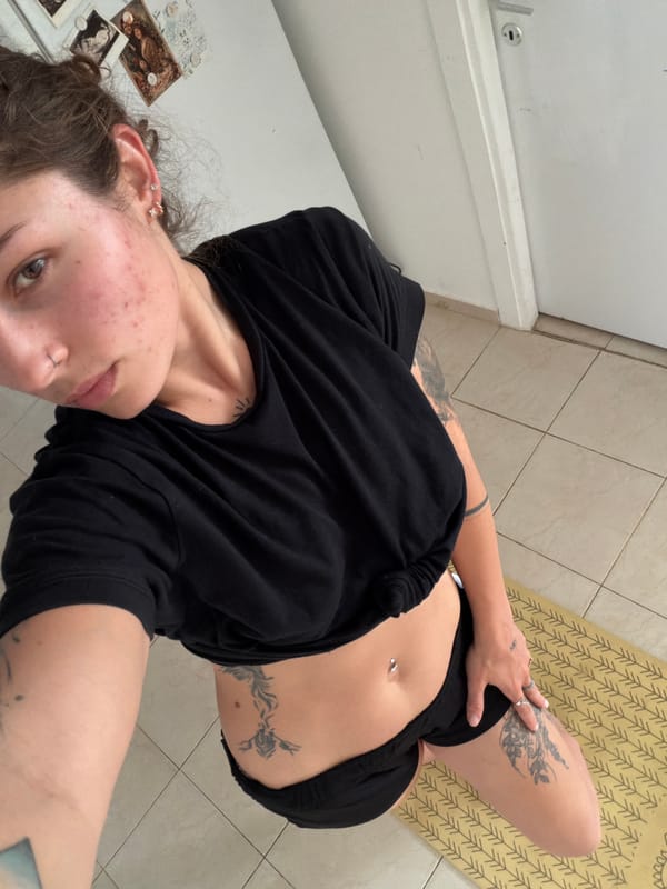Woman photographed indoors in Kiryat Bialik kitchen area