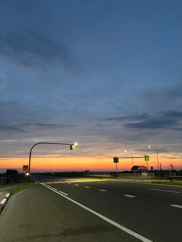 Sunset over a quiet rural road in Belarus