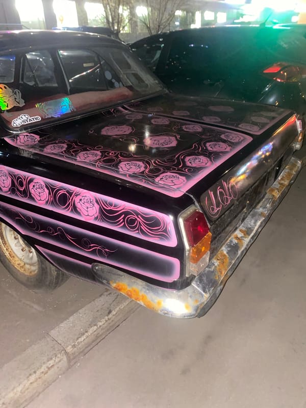 Custom painted car and button graphic documented at same location