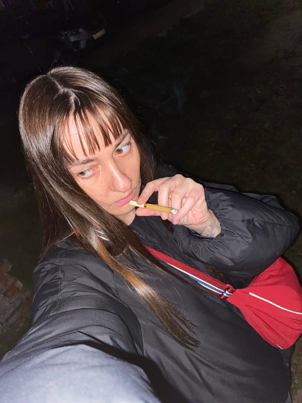 Woman smoking cigarette observed in Votkinsk, Russia