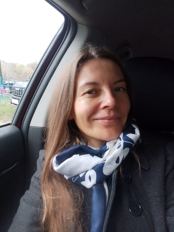 Morning moments captured in Nerezha: woman in car, rural gravesite