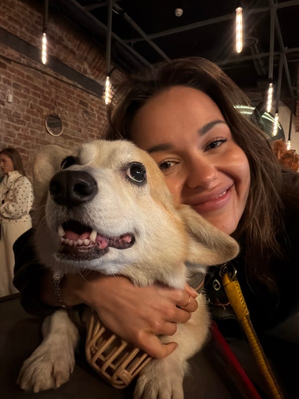 Woman shares tender moment with corgi in Saint Petersburg venue