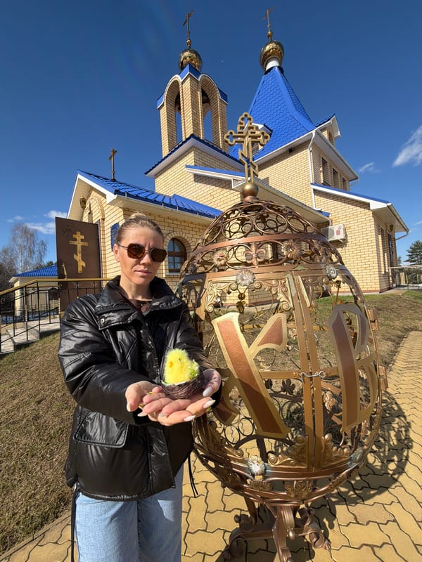 Woman visits Orthodox churches with Easter items in Chaikovsky