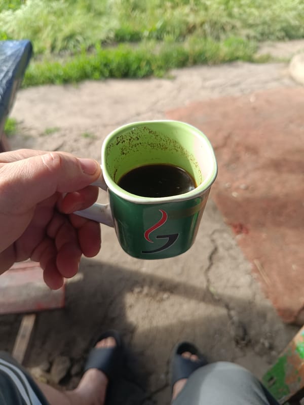 Coffee break on cracked pavement in Stanislavka