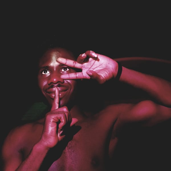 Person photographed making hand gestures in Narayi, Nigeria