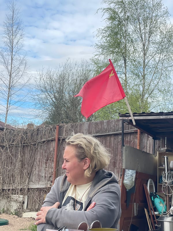 Casual outdoor gathering captured in Sestroretsk backyard setting