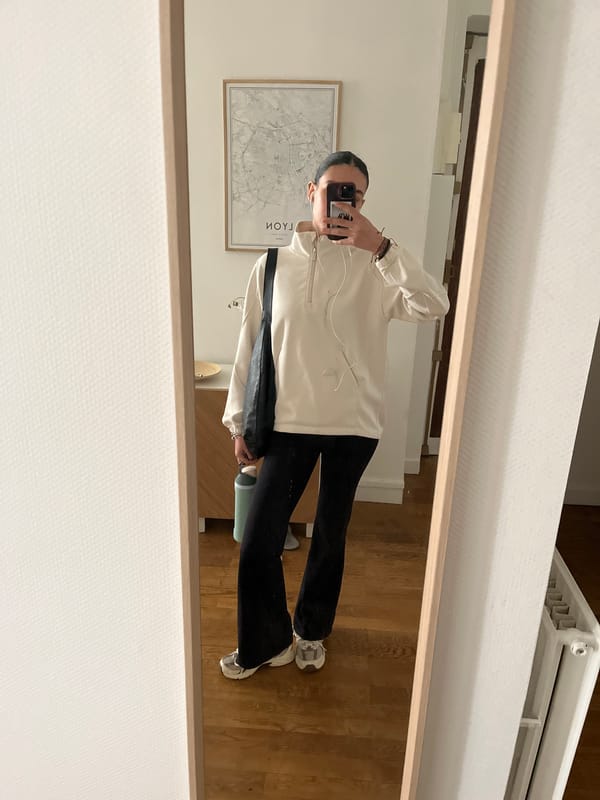 Person documents historic Lyon building's architectural features in selfie tour