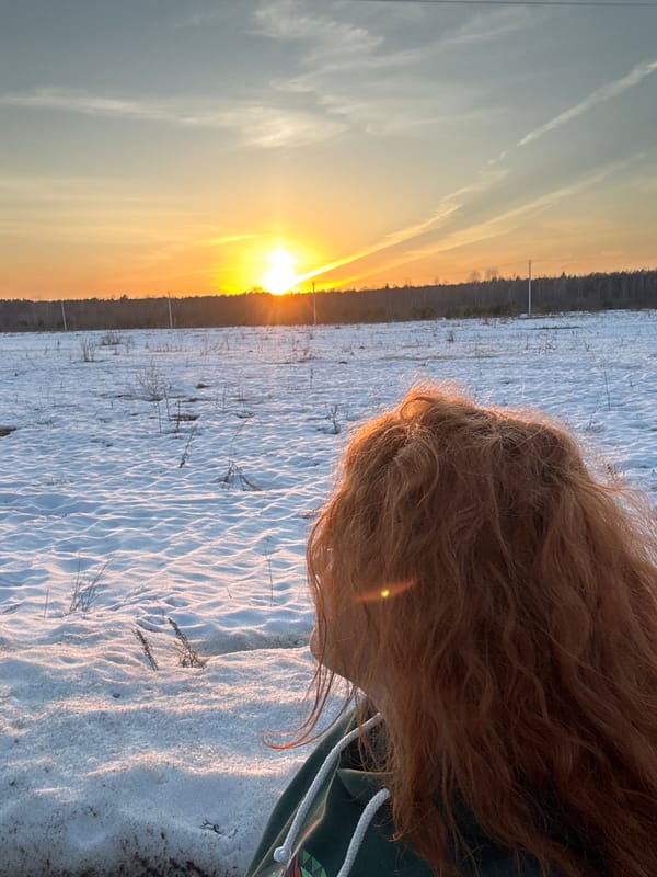 Woman enjoys winter dog walk in Noviy Russia