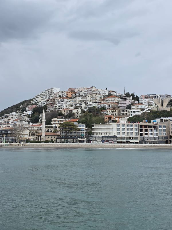 Tourist explores historic Ulcinj Old Town and coastal views