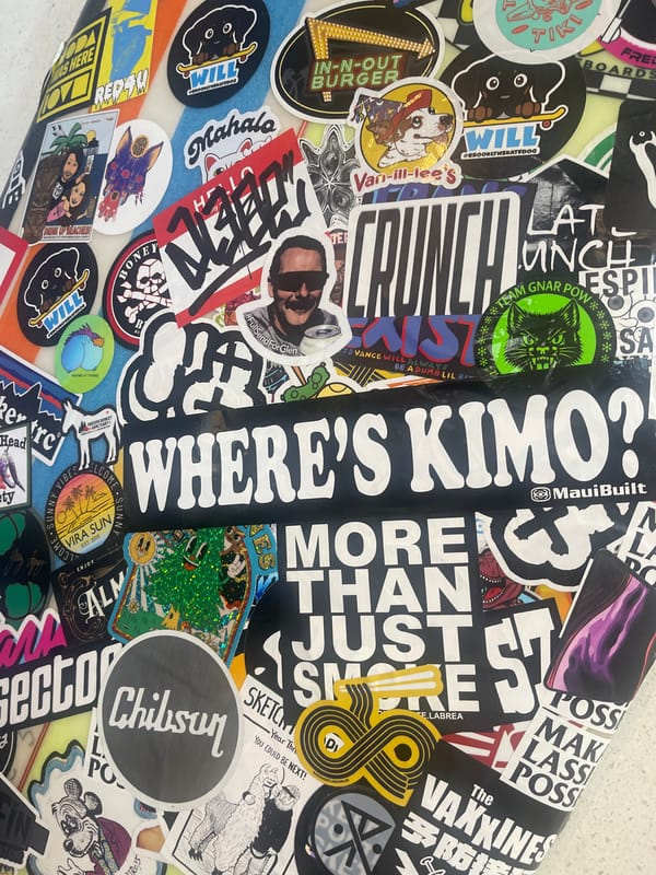 Sticker-covered surfboards documented at Los Angeles taco restaurant