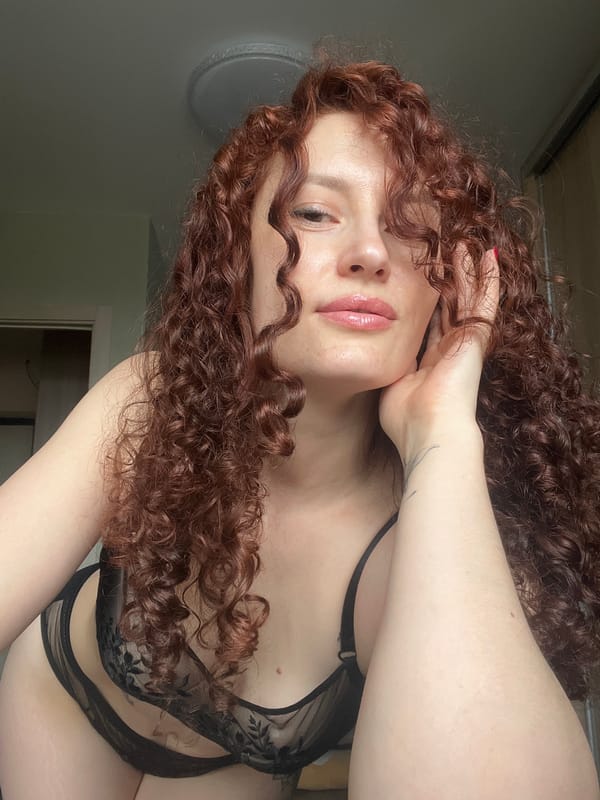 Person photographed in lingerie in Saint Petersburg indoor setting