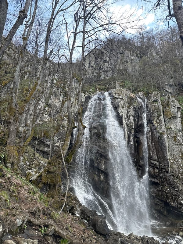 Witness documents waterfall cascade over rocky terrain in two-minute span