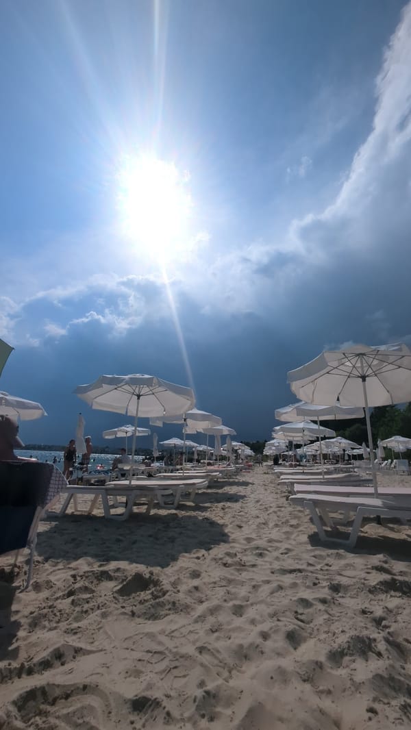 Packed beach chairs on a sunny day in Ravda, Bulgaria