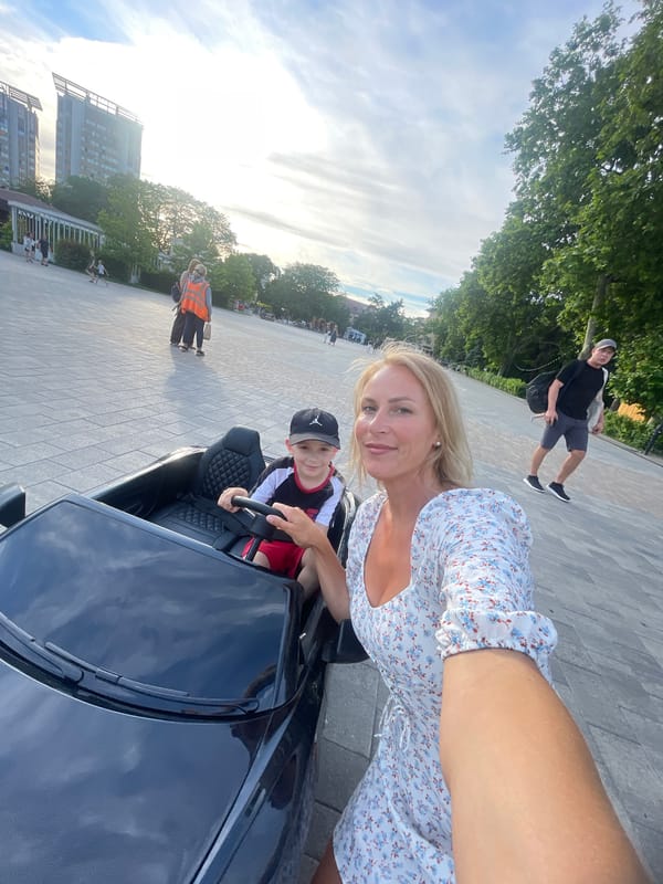 Sunny afternoon out in Anapa — playgrounds, toy cars, and street strolls