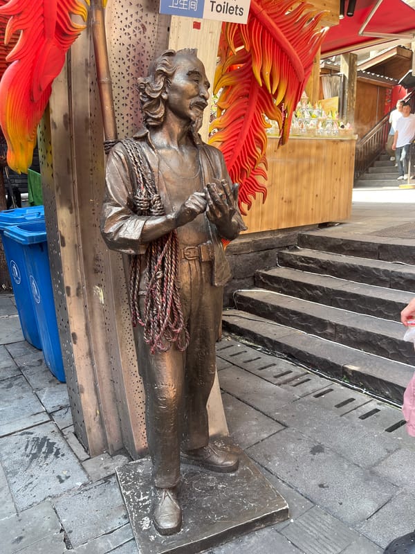 Traditional-themed street market buzzing on a June morning in Chongqing