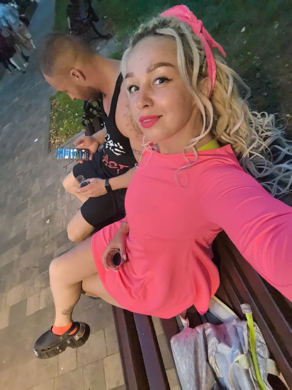 Park bench hangout in Nizhny Novgorod, bold pink and Balenciaga