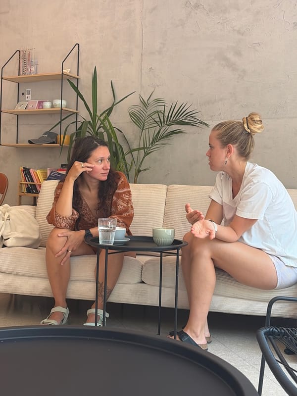 Casual interior scene in Budva with a concrete wall backdrop
