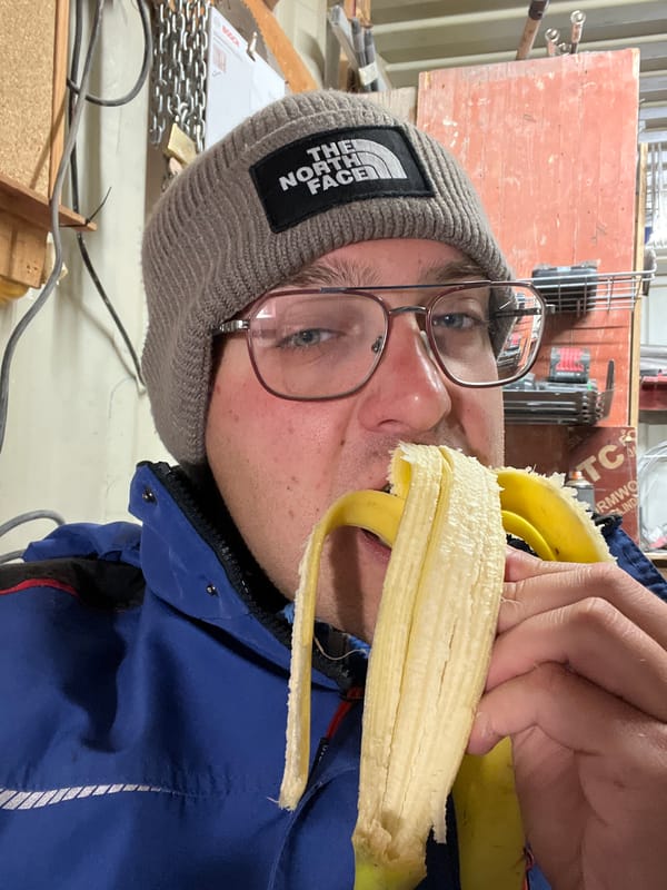 Worker takes snack break near construction site in Varna