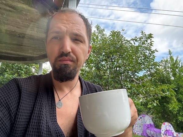 Lazy morning in a Sochi backyard — coffee, selfies, kids playing