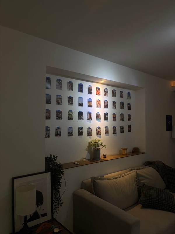 Resident documents home art displays in Mexican living room