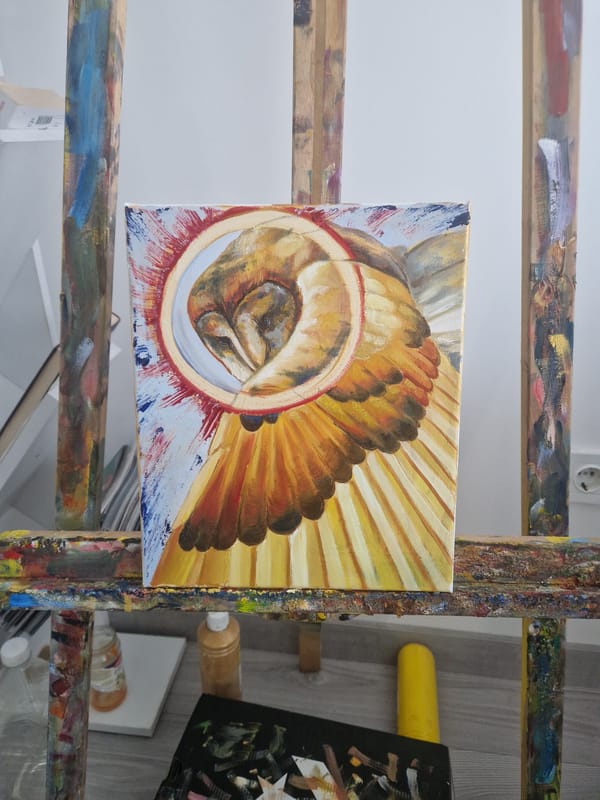 Art studio workspace documented with paint-splattered easel
