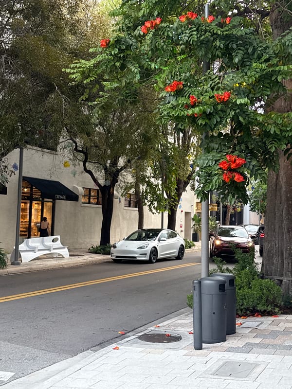 Woman takes evening selfie in Miami wearing personalized jewelry