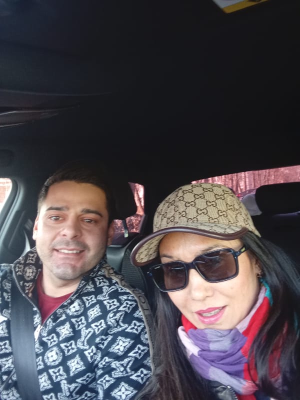 Couple photographed with Audi vehicle in Izhevsk parking area