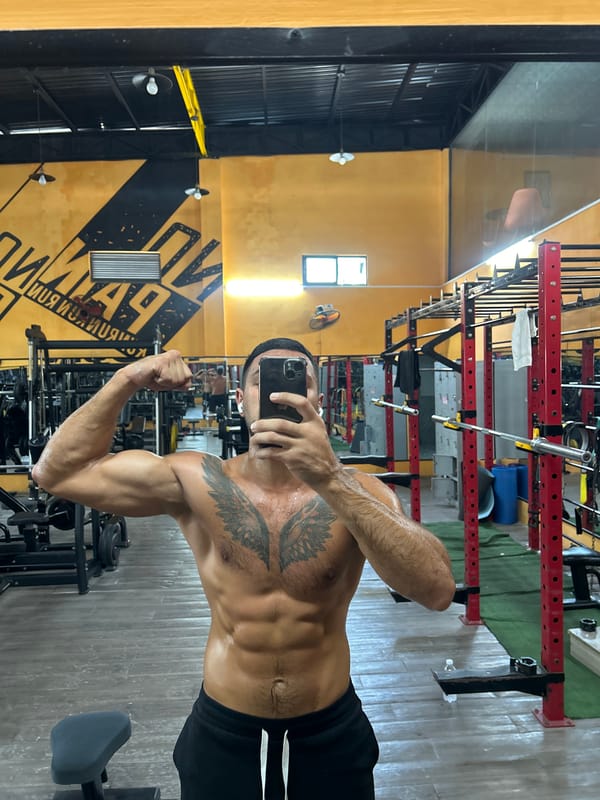 Gym mirror selfie flex in Nha Trang
