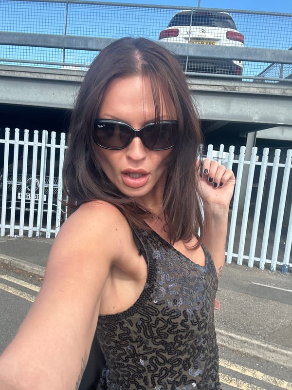 Selfie session in a Tonbridge parking lot, sequined top and shades