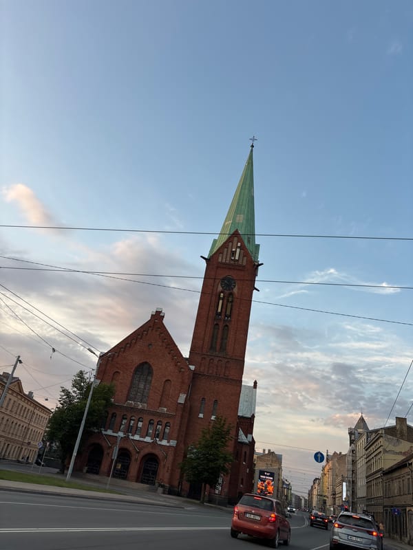 Riga church tower and a cold Latvian beer, same evening