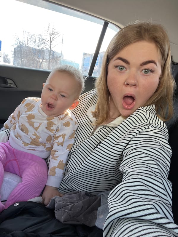 Woman with baby photographed in vehicle, Perm Russia
