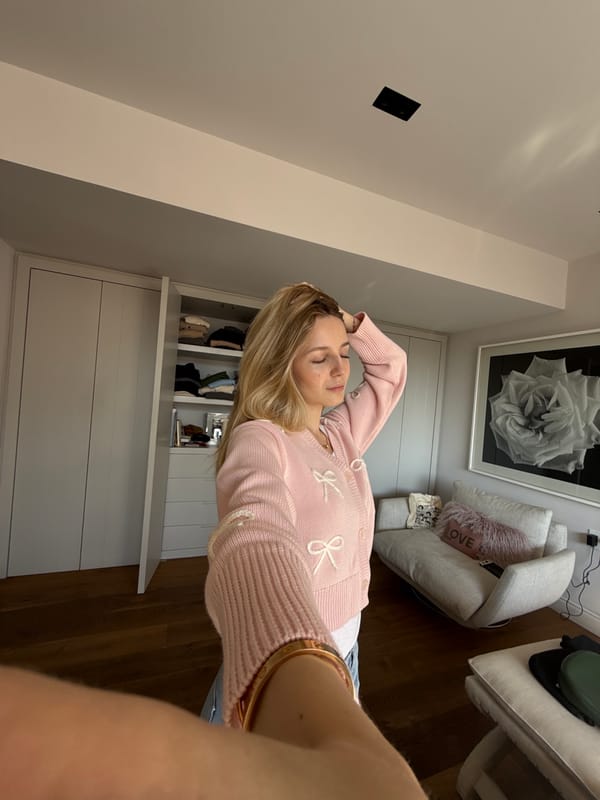 Woman resting in pink cardigan captured in Mexico City